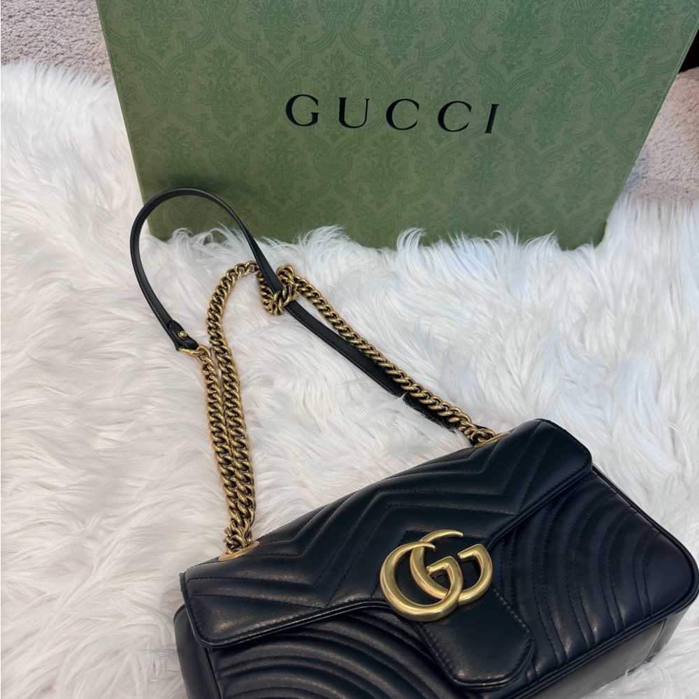 Gucci marmot black pre-owned excellent condition